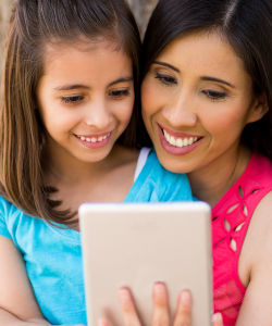 Mother and daughter getting Floriamed fast and easy online care with a tablet